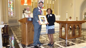 Beverly Cooper accepts the 2016 Madonna Della Strada Award at St. Mary's Spiritual Center.