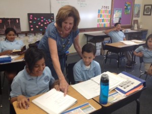 Julie Bishop, mother of 4 and a retired teacher, teaches writing skills to middle schoolers at Nativity Prep Academy in San Diego.