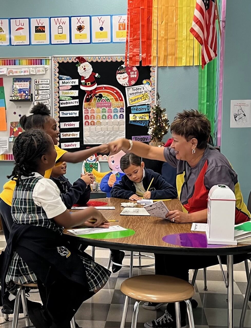 ivc corps member volunteering with children