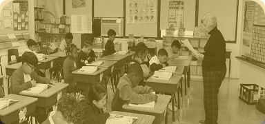 Old photo of an IVC corps member at a school